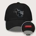 Duck Dad Hat in black: front, with the back inset showing the red pill above the strap